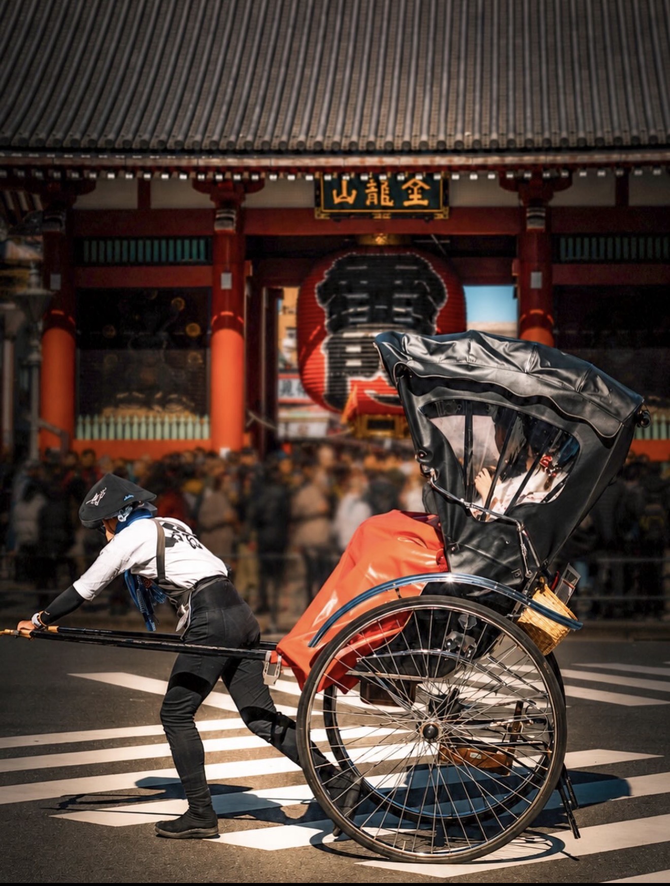 Traditional rickshaw in front of Kaminarimon