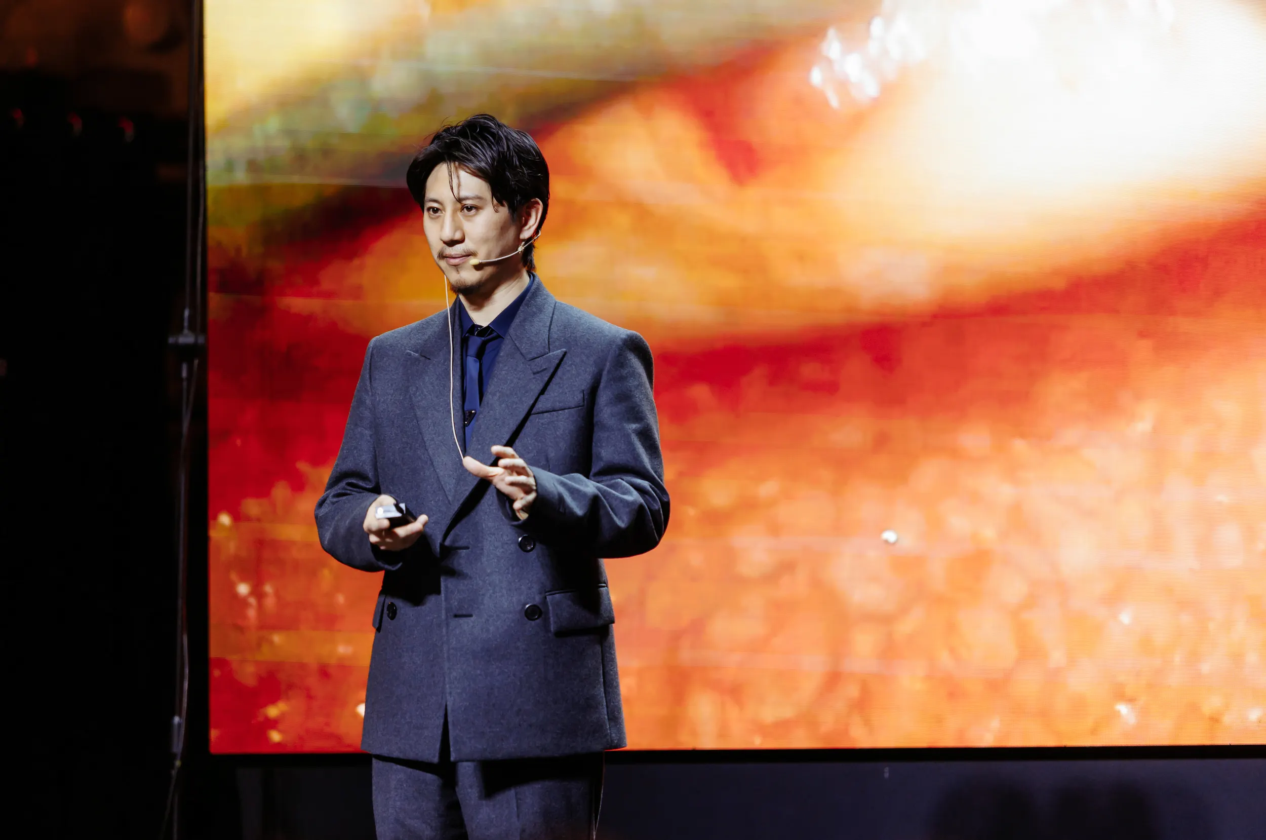 Dr. Yudai Ogawa speaking on an international stage